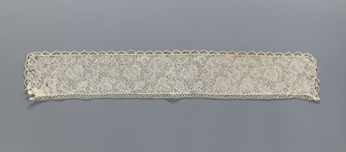 Fragment of bobbin lace with plant ornaments, 18th century, Flanders; width 7 cm, length 74 cm;