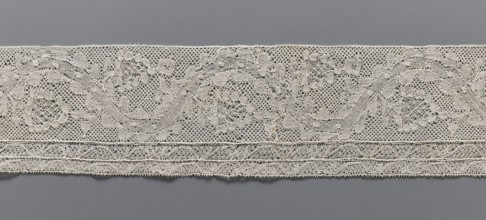 Lace fragment, bobbin lace Malines/Mechelen, 18th century. Plant ornaments: floral branches grow in