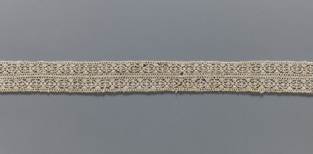 Fragment of needle lace, 16th–17th century, Flanders; width 2.8 cm, length 55 cm; provenance: