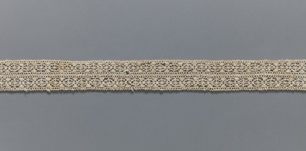 Fragment of lace, needle lace, 16th/17th century, Flanders; width 2.8 cm, length 55 cm;, A