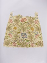 Two fragments of a dalmatic, embroidery on silk fabric interwoven with silver thread, front and