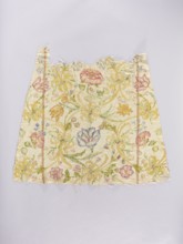 Two fragments of a dalmatic, front and back, of silk fabric interwoven with silver thread. The