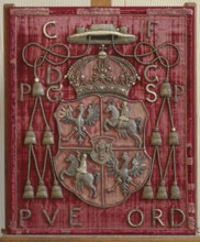Back of a throne or bishop's chair made of red velvet with an applied coat of arms of the