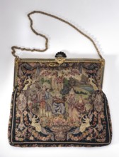 Women's handbag. Handbag in the shape of a rectangle, slightly narrowed at the top. Embroidered