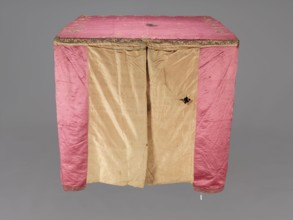 Church cope, liturgical vestment, raspberry satin embroidered with floral patterns. On the front,