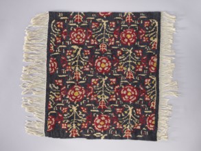 Tapestry covering; floral ornaments and stylized flower trees identical on the seat and backrest;