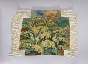 Tapestry chair cover, repossession provenance; design of flowers, leaves, and floral ornaments;
