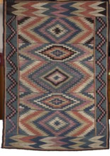 Kilim, Kilim with vertical stripes in rhombus motifs that merge concentrically into hexagons, their