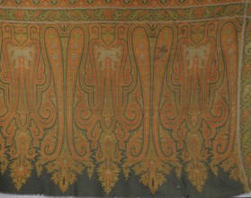 Fragment of a cashmere shawl. Its ending features two types of stylized palmette motifs, some