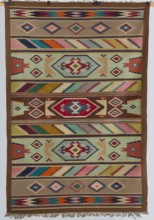 Kilim, The kilim is divided symmetrically into vertical stripes. The widest central stripe is