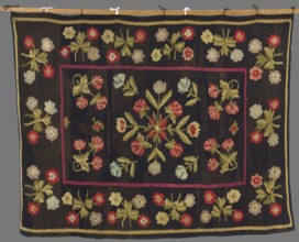 Kilim, 19th century, Poland. Wool fabric, height 214 cm, width 167 cm. In the center is a
