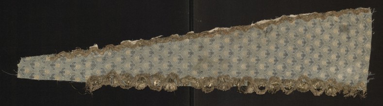 Fragment of a garment, fabrics with a preserved report, silk fabrics, floral patterns, fragments of