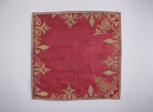 Velum of dark red satin embroidered around the edges with gold and silver thread in motifs of