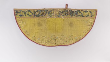 Church cope made of yellow silk fabric, embroidered along the edges with colorful floral sprigs