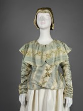 Women's caraco 18th century, blue and white silk brocaded and embellished with rose branches.