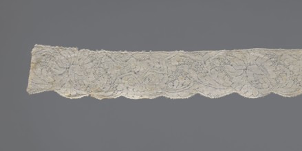 Lace fragment, early 18th century, Binche. Plant ornaments with rosette and rose motifs; twig motif