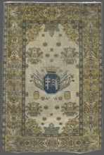 Rug with the Potocki and Mniszech coats of arms. 1st half of the 18th century. Poland Brody ?.