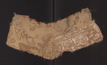 Patterned silk fabric fragment, early 18th century, France. Two-color damask with stylized leaves
