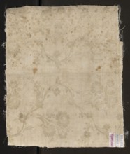 Fabric fragment, silk, patterned floral double-warp fabric. Cream and silver lamé with a pattern of