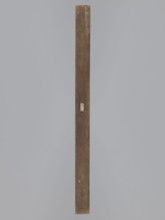 Double-sided gingerbread mould. Side A: image of a bachelor; Side B: baby in swaddling clothes.,