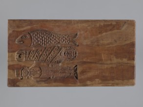 Double-sided gingerbread mould. Side A: bison; Side B: three figures — a bachelor in