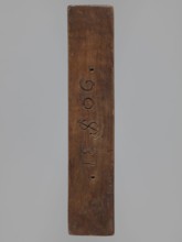 Double-sided gingerbread mould. Side A: bison. Side B: three figures — a bachelor in early