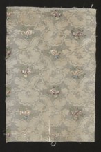 Fabric fragment, fragments of silk patterned fabric with floral patterns. Fragment of