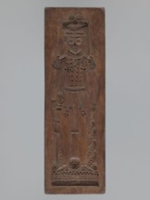 Double-sided gingerbread mould. Side A: image of a soldier; Side B: baby in swaddling clothes.,