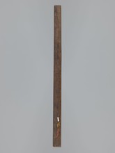 Double-sided gingerbread mould. Side A: female figure in a decorative bonnet and long patterned
