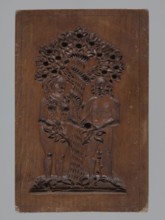 A single-sided gingerbread mold with the image of Adam and Eve in paradise. A single-sided,
