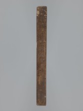 Double-sided gingerbread mould. Obverse: rectangular floral and geometric ornament; on one side a