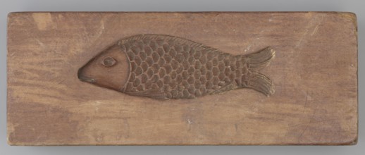 Double-sided gingerbread mould. Side A: figure of a lady in a decorative, pleated dress from the