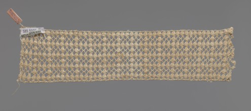 Fragment of crocheted lace — section of a belt, cream-colored, with motifs of semicircular shells