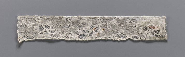 Lace fragment, bobbin lace Valenciennes, white, continuous floral pattern with Rococo motifs, 18th