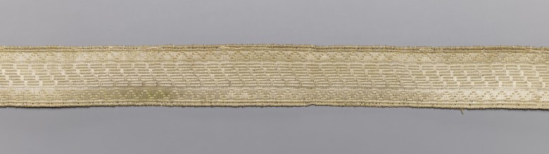 Gallon, galloons haberdashery, geometric ornaments, white warp, weft - wire - drawn thread. Faint