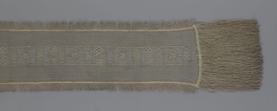 A so-called Saxon lace belt, lace belt accessory for men's clothing. The central part is a