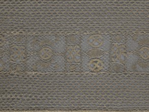 A so-called Saxon lace belt, lace belt/clothing accessory for men's clothing. The central part is a