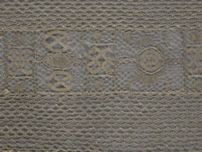 A so-called Saxon lace belt, lace belt as men's clothing accessory; central continuous belt with