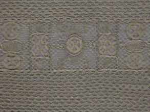 A so-called Saxon lace belt, lace belt accessory for men's clothing. The central part is a