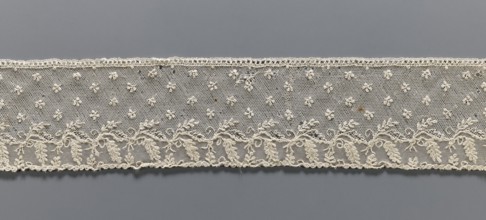 Fragment of lace, Alençon lace decorated with small twigs in projections and a tendril with