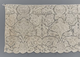 Lace fragment, unknown creator; purchase provenance. Brussels lace, early 18th century. Pattern