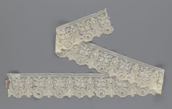 Lace fragment, lace with plant ornaments. Serrated on one side, with a pattern of flowers,
