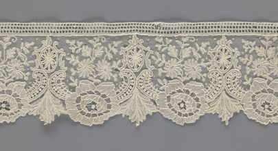 Lace fragment, purchase provenance; lace with plant ornaments. Serrated on one side, pattern of