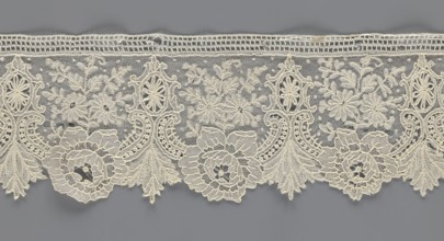Lace fragment, lace with plant ornaments. Serrated on one side, with a pattern of flowers,