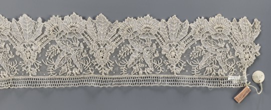 Lace fragment, Plant ornaments; pattern of stylized leaves and flowers, serrated on one side.