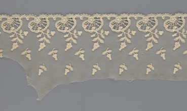 Fragment of lace, lace with plant ornaments, slightly serrated lower edge, shell motifs with