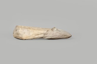 Flat women's slippers of white satin, top edge finished with ribbon. Flat-cut toes, symmetrical