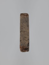A single-sided gingerbread mold of rectangular shape with the image of a male figure in a richly