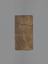 Double-sided gingerbread mold. Obverse: baby in swaddling clothes richly decorated with various