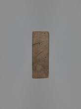 Double-sided gingerbread mould. Obverse: female figure in a long, patterned, richly decorated